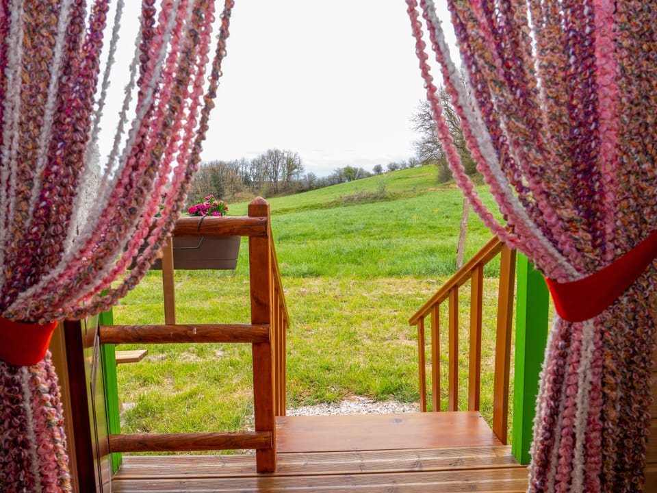 Trailer, its balcony, countryside view