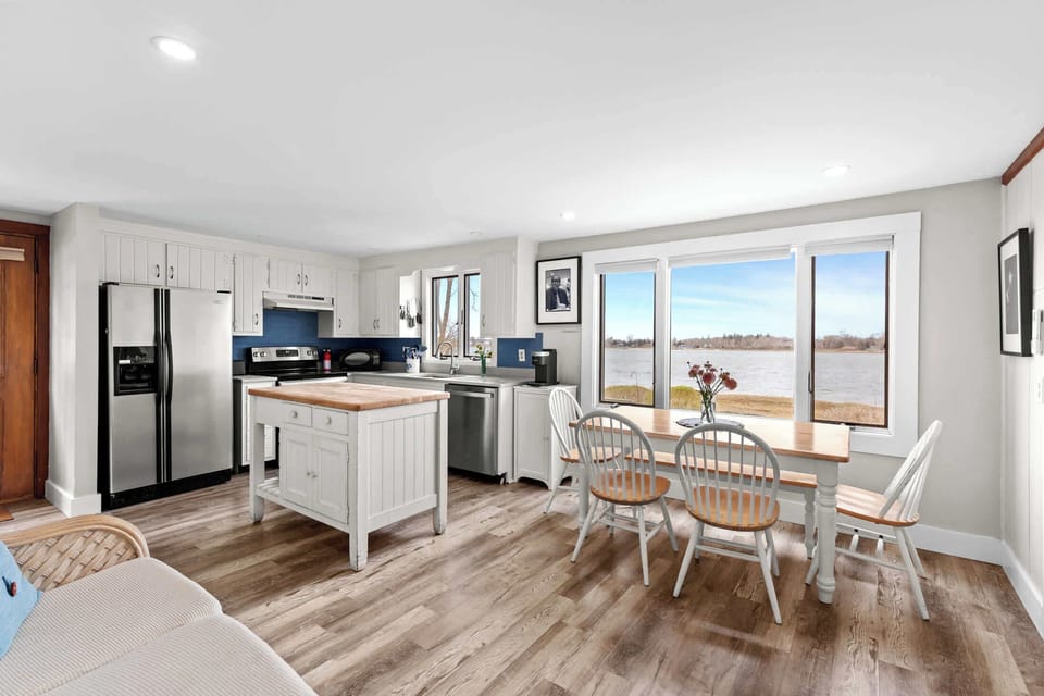 Updated kitchen and dining area with beautiful water views
