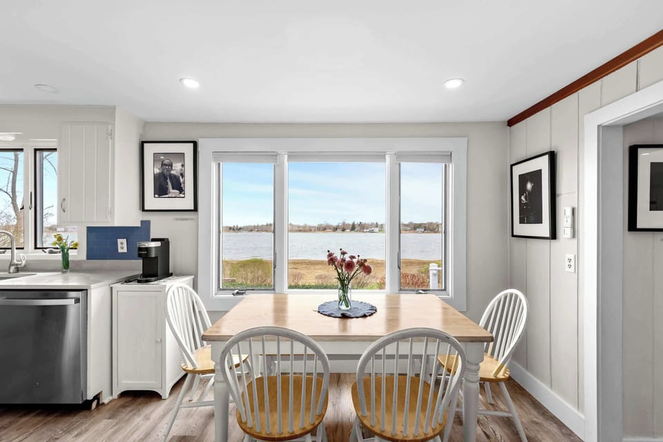Dining table perfectly positioned to overlook the water