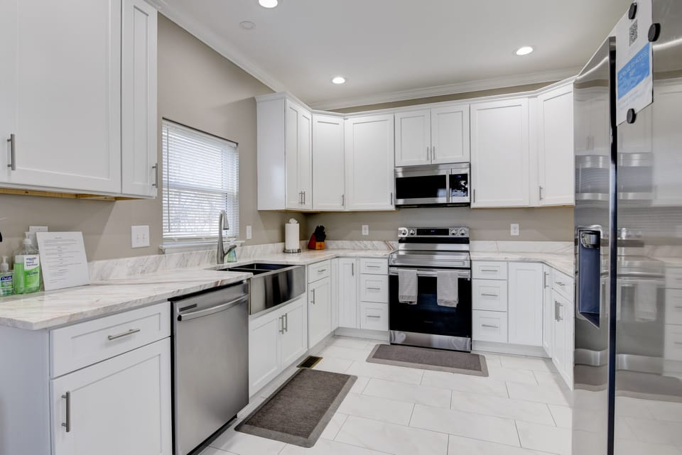 Ample storage and counter space with a well-stocked cabinet of seasonings.