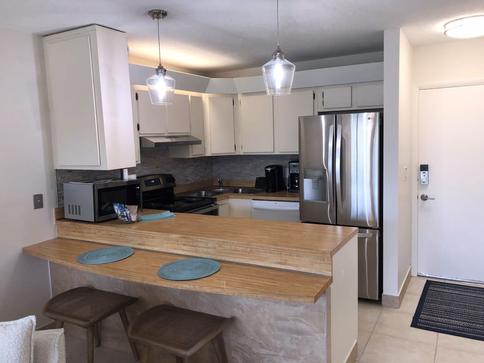 Kitchen with new sink and butcher board counter top
