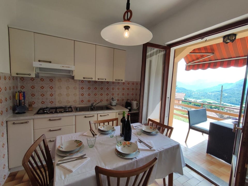 Table, Furniture, Property, Tableware, Chair, Wood, Interior Design, Lighting, Cabinetry, Living Room