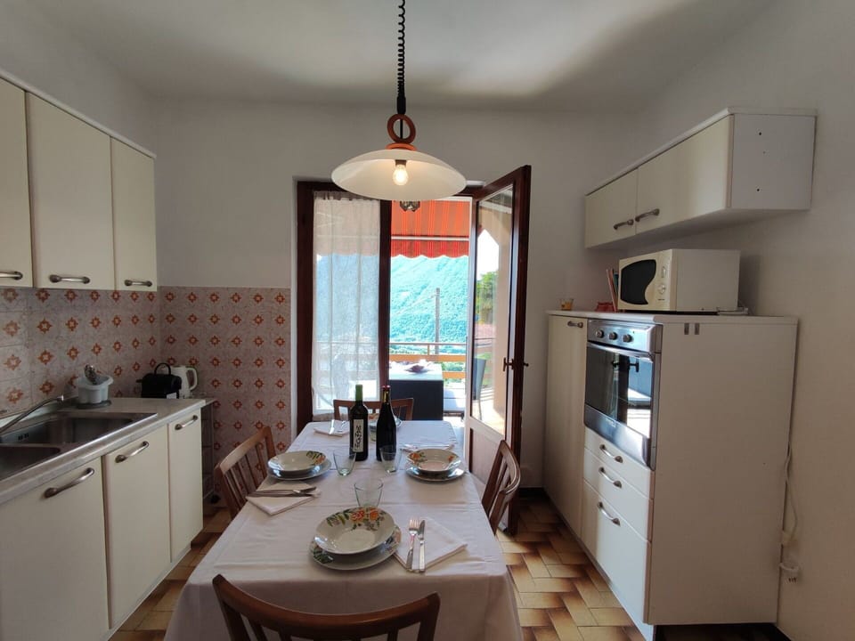 Cabinetry, Property, Furniture, Countertop, Table, Drawer, Kitchen Appliance, Sink, Wood, Lighting