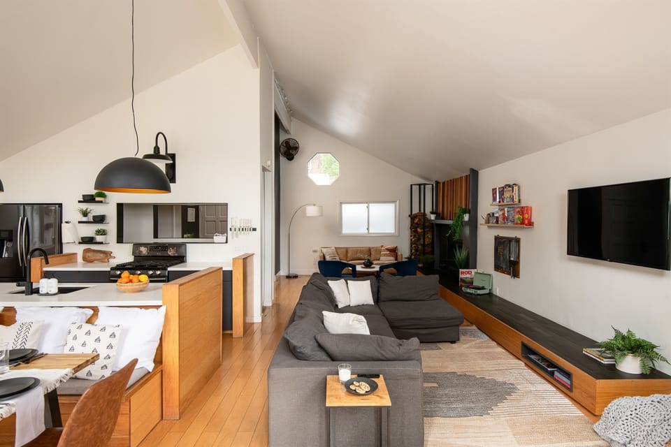 Open-concept living, dining, and kitchen space designed for gathering—plenty of room to cook, relax, and spend time together in one connected area.