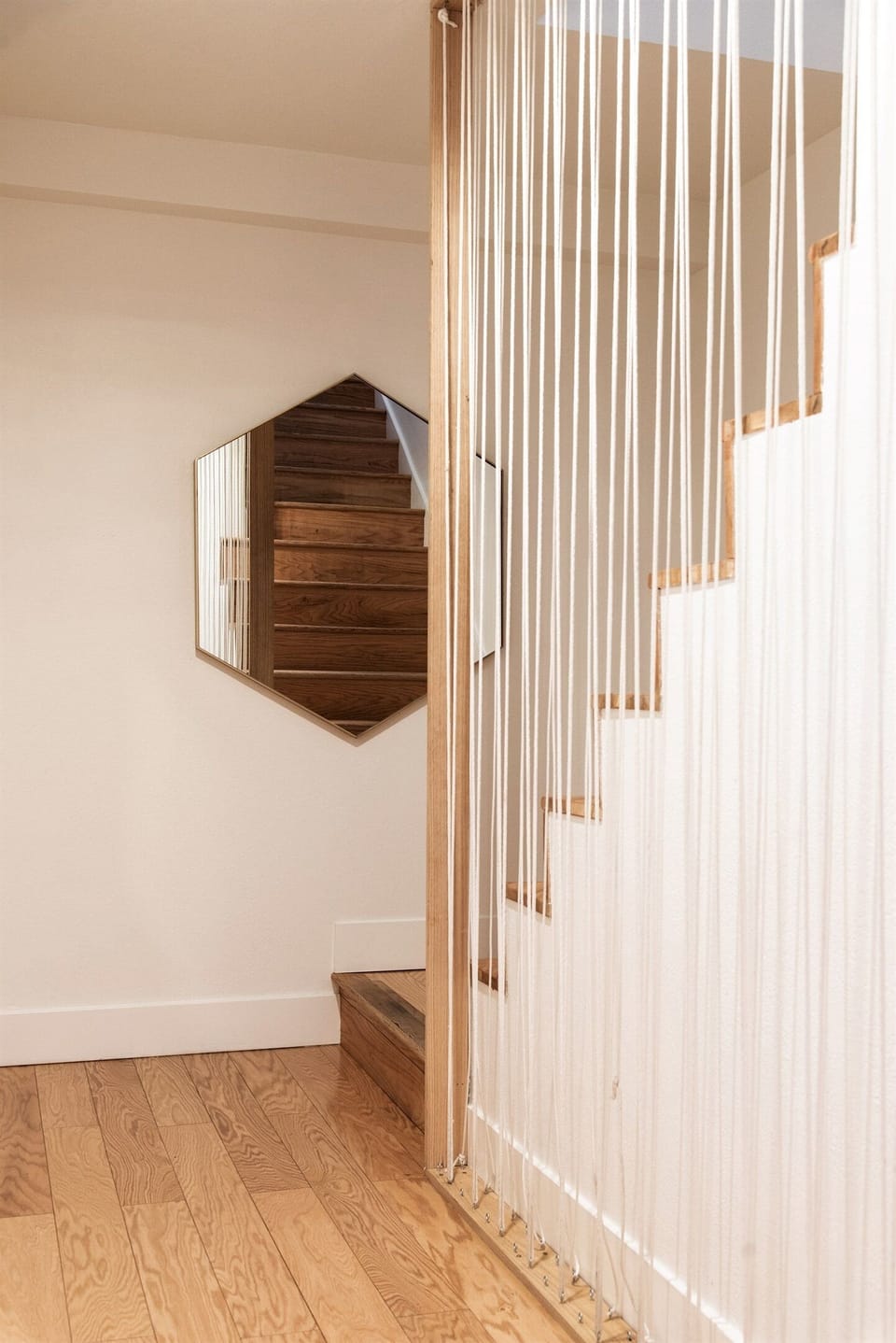 Modern staircase with clean design and open feel—connecting levels of your Lake Arrowhead cabin with style and ease.