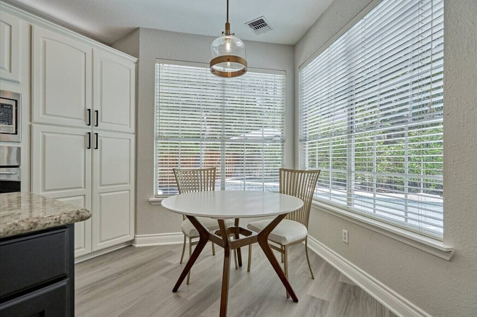 This intimate breakfast nook is the perfect spot for a quick bite or a quiet cup of coffee.