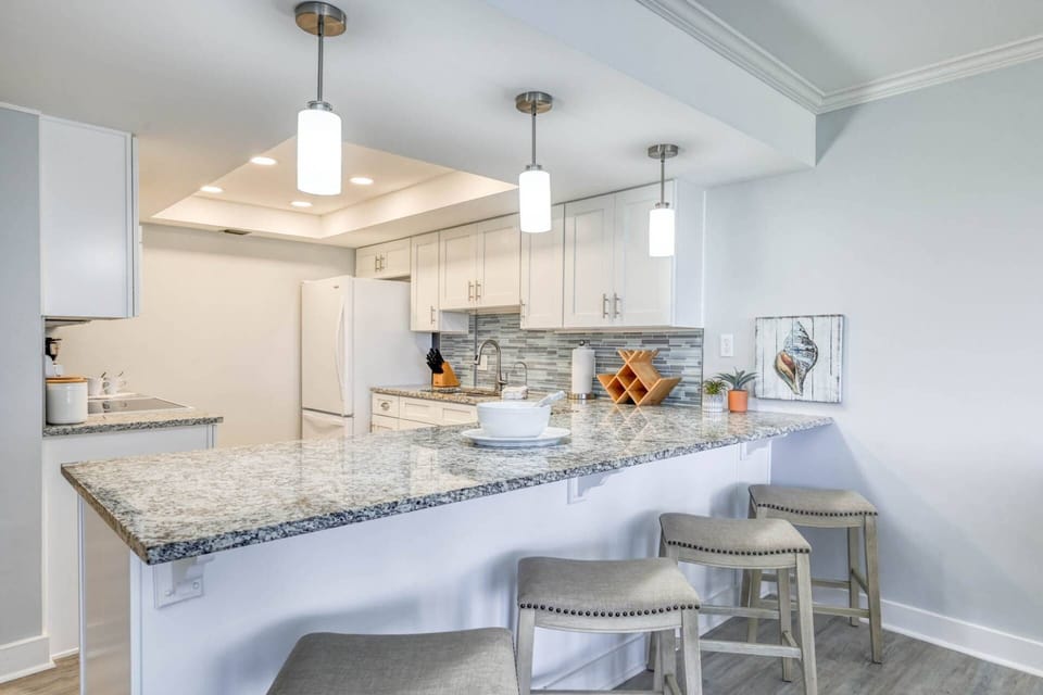 This beautiful kitchen has all the essentials to cook your favorite meal.