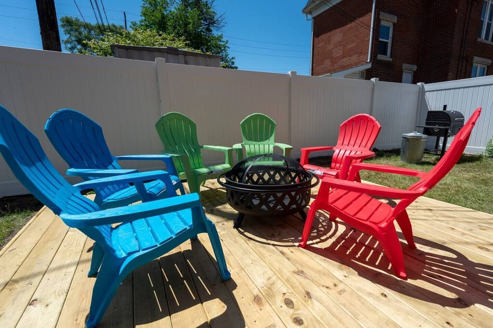 Gather your group around the firepit with its comfortable Adirondack chairs.