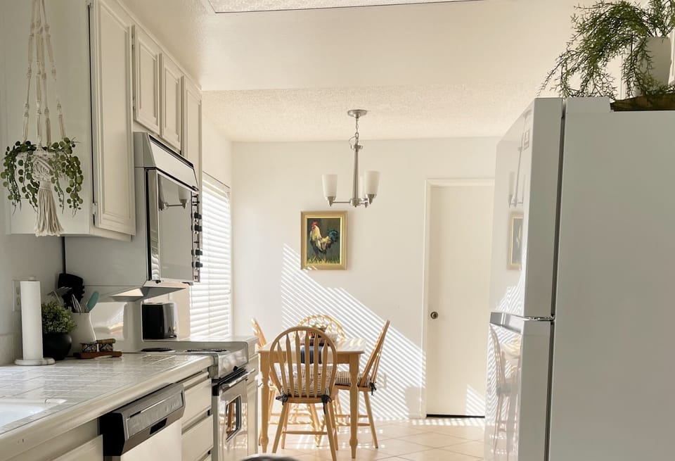 Dish washer, and a laundry room as well!