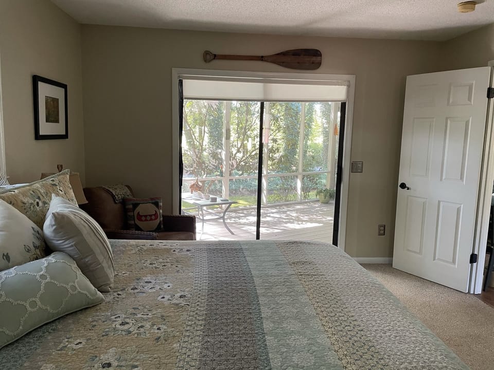 Opens to screened in porch.