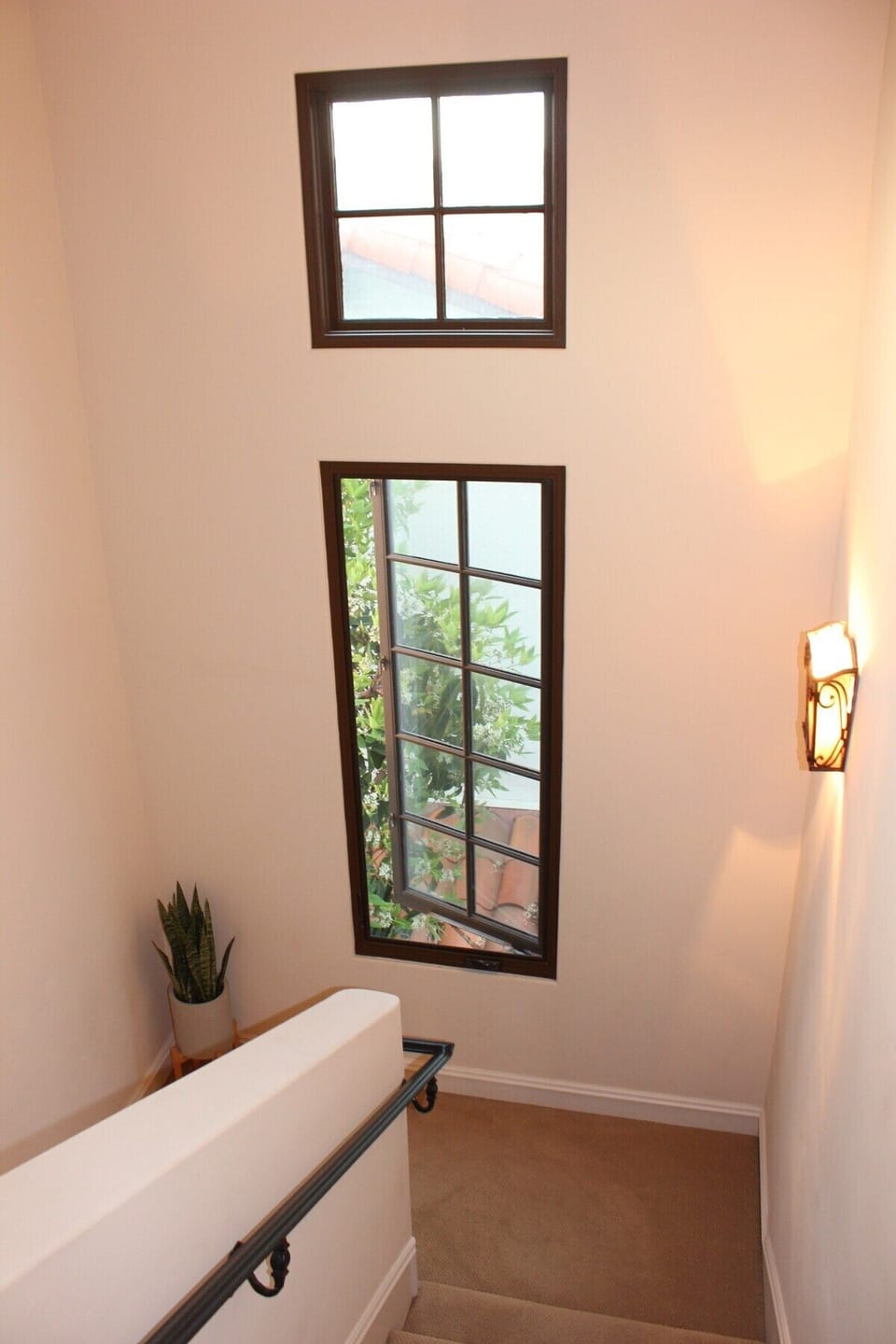 Stairs leading to the Primary Bedroom Suite