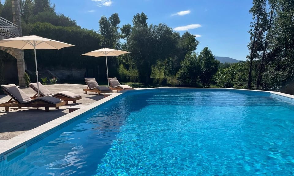 Villa Jovicic: Relax by the pool with stunning views in Herceg Novi, Montenegro.