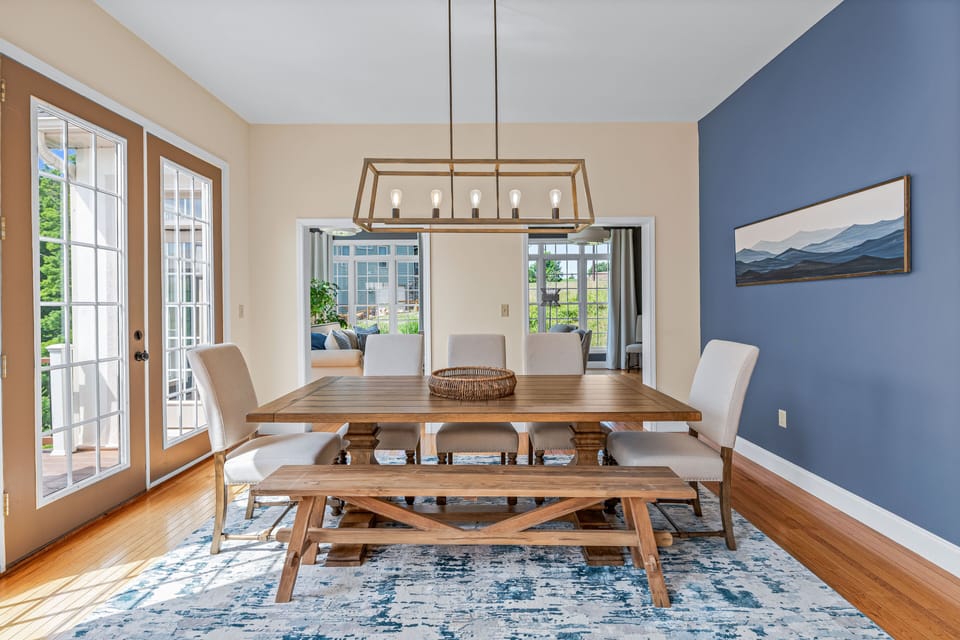 Enjoy Family Meals In This Stylish Dining Room With Modern Decor.