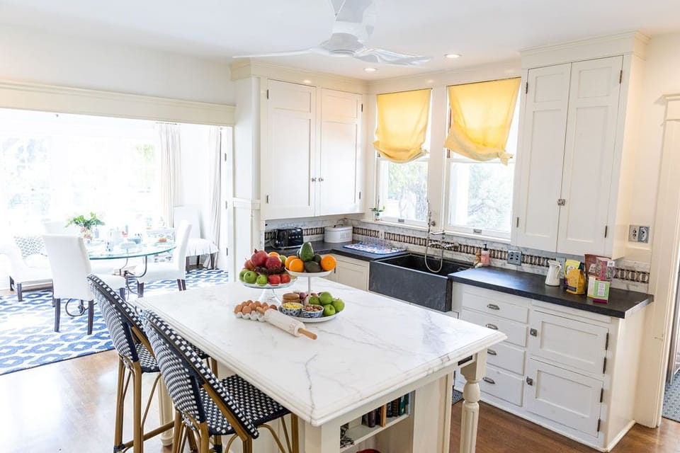 Kitchen with eating area off to side