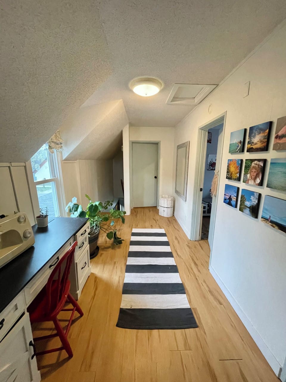 Upstairs hallway. View from the bathroom, stairs  to the left