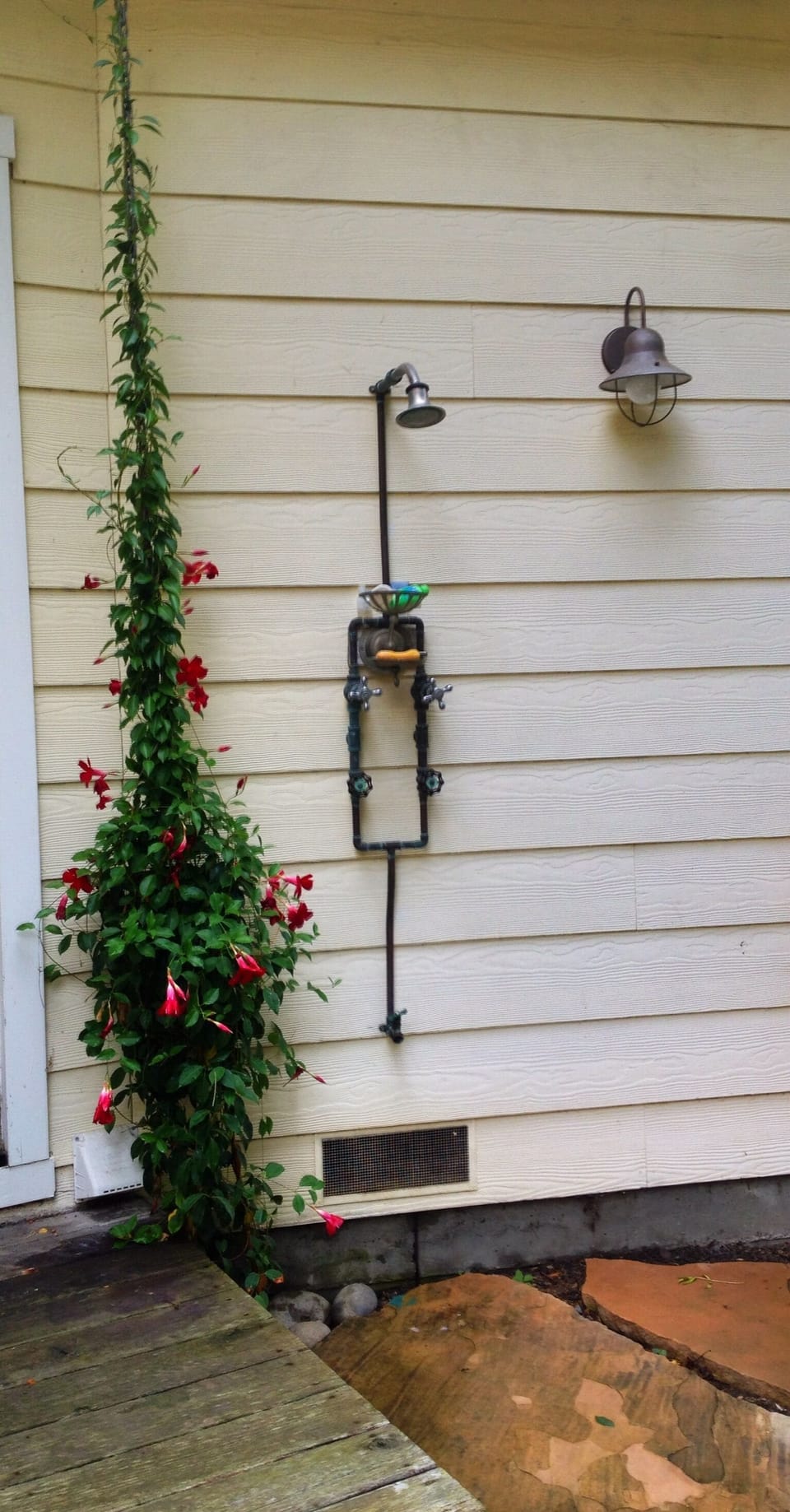 Outdoor shower in backyard.