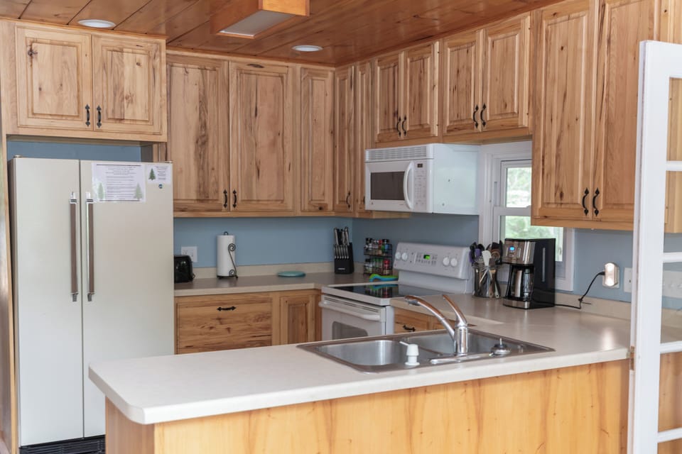 Fully stocked kitchen for all your cooking needs.