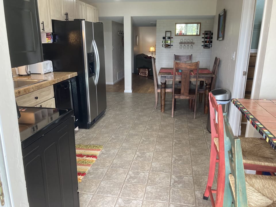 Looking from the sliding door, through the kitchen and towards the living room