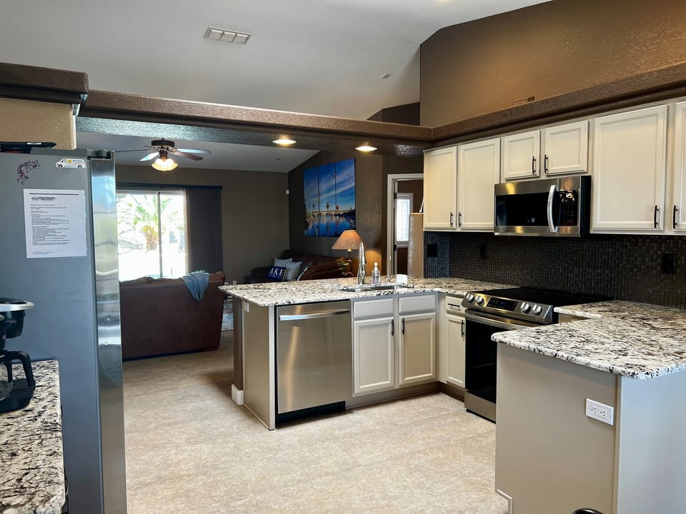 Fully Equipped Kitchen | Granite Counters | Stainless Steel Appliances | Bar Seating for 2