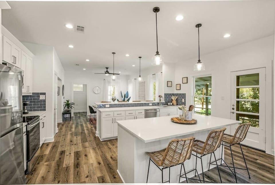 Unit A Kitchen: 2 Islands w/ Bar Height Seating