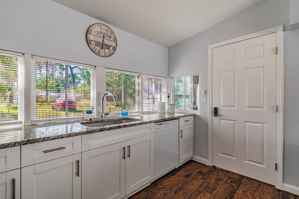 Wonderful view of the fully fenced backyard from the kitchen windows.