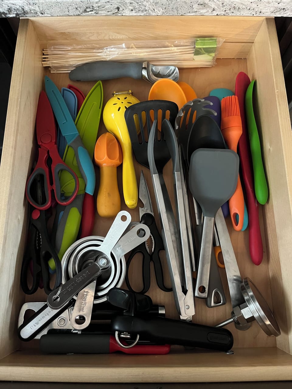 Fully stocked kitchen with utensils, dishes, mixer, waffle iron, crock pot, etc