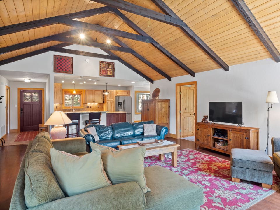 Gathering room with new 55 inch Roku TV and wood burning fireplace