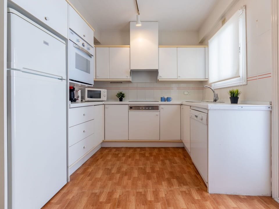 Cabinetry, Countertop, Kitchen Appliance, Kitchen, Home Appliance, Kitchen Stove, Wood, Interior Design, Flooring, Floor