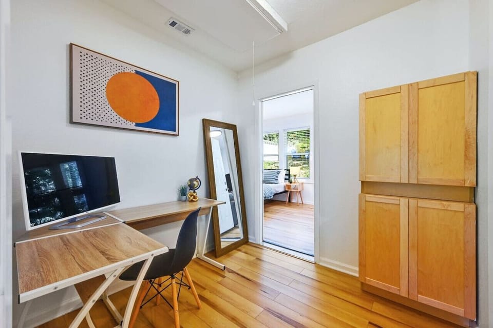 Quiet workspace with desk—ideal for business travelers and students.