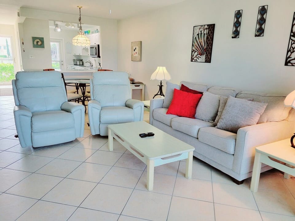 Living room, dining area, kitchen, lagoon view