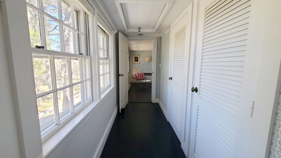 Hall leading from ensuite bathroom to second floor master