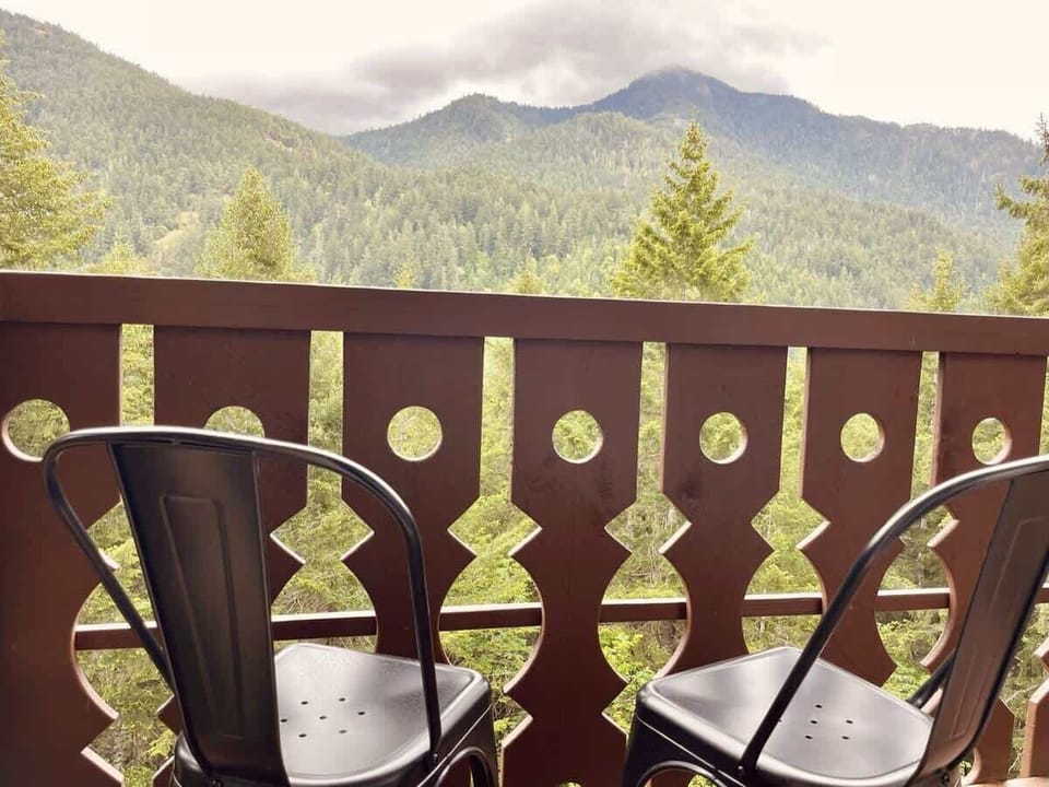 One of the two private balconies in the Pacific Spruce Heights Suite for surveying the scenery.