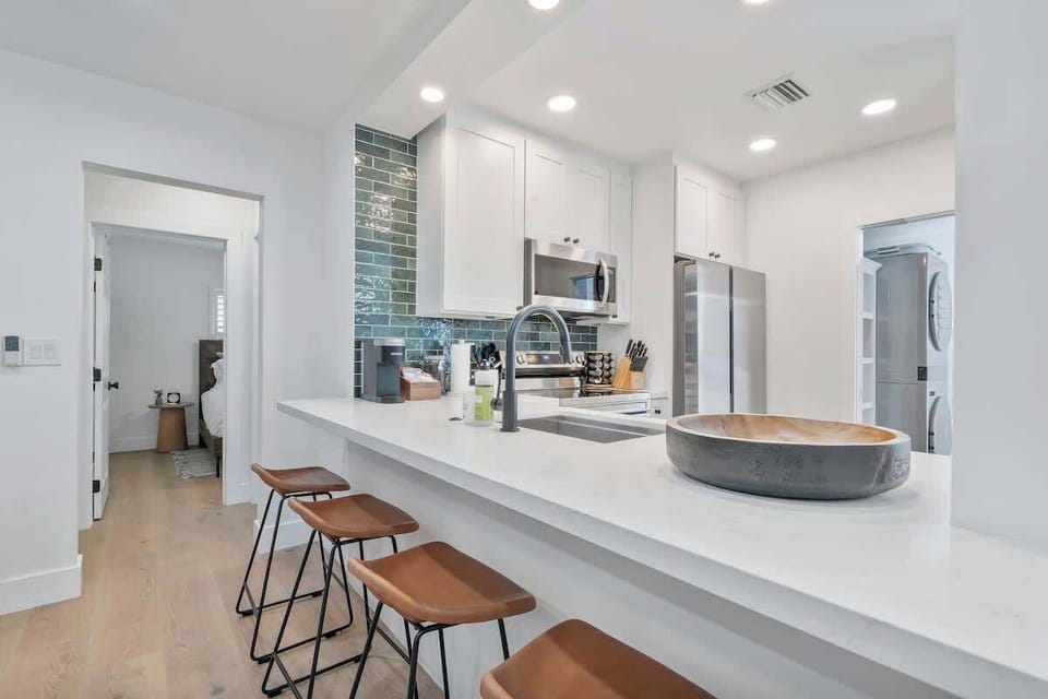 Eat-in kitchen bar with seating for four.