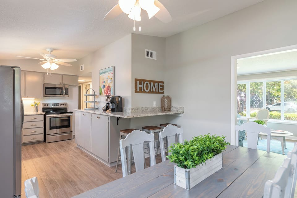 Just steps from the kitchen, the cozy dining area blends convenience with comfort, featuring seating for six.
