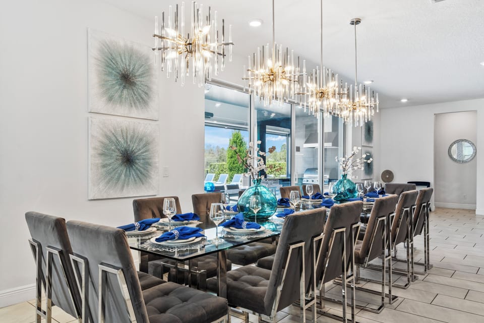 Dine in style at the formal dining table, which comfortably seats 14 guests for any occasion