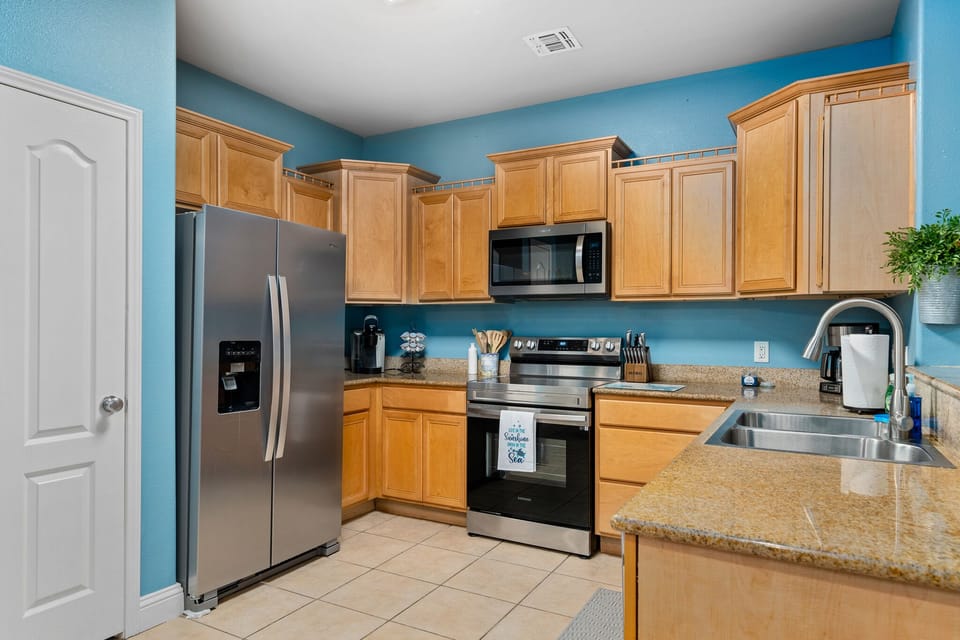 Fully stocked kitchen and brand new propane grill outside to cook your catch