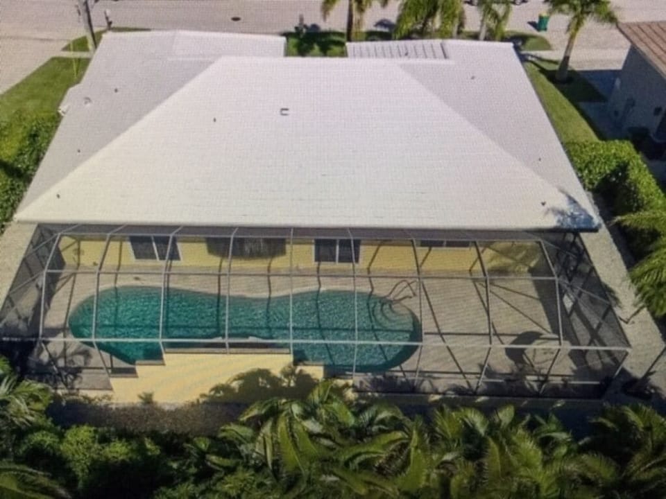 Ariel view to note oversized pool