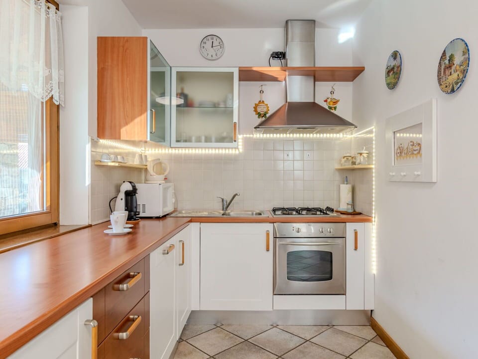 Cabinetry, Countertop, Property, Furniture, White, Kitchen, Kitchen Stove, Wood, Interior Design, Window