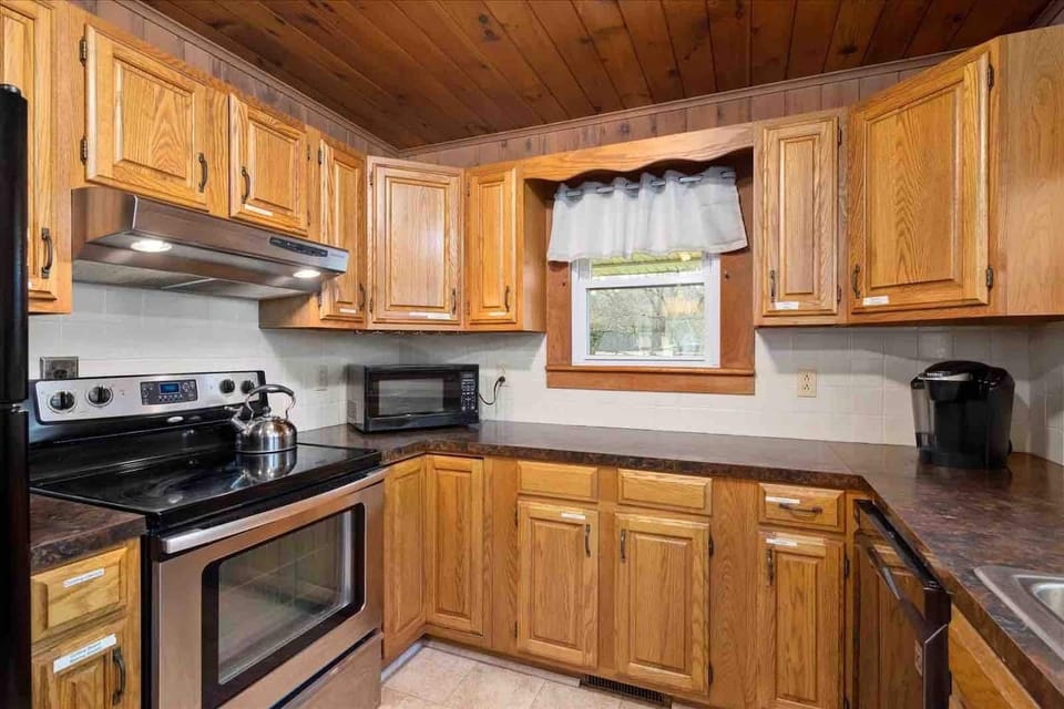 Sleek and functional kitchen space, perfect for preparing meals or enjoying a morning coffee