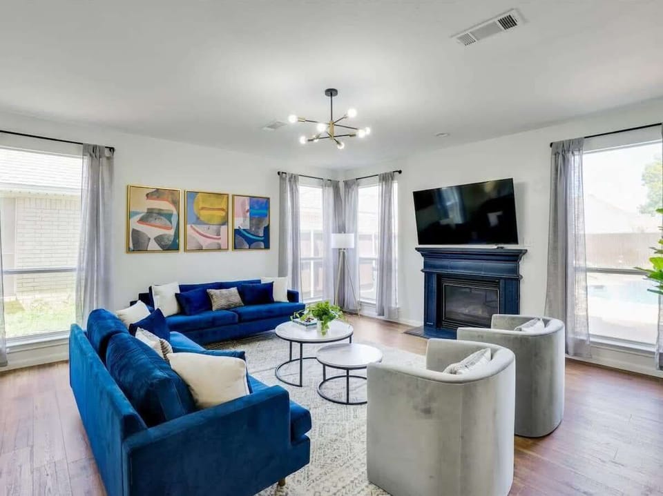 This living room is the perfect blend of sophistication and comfort - sit back, relax, and make yourself at home!
