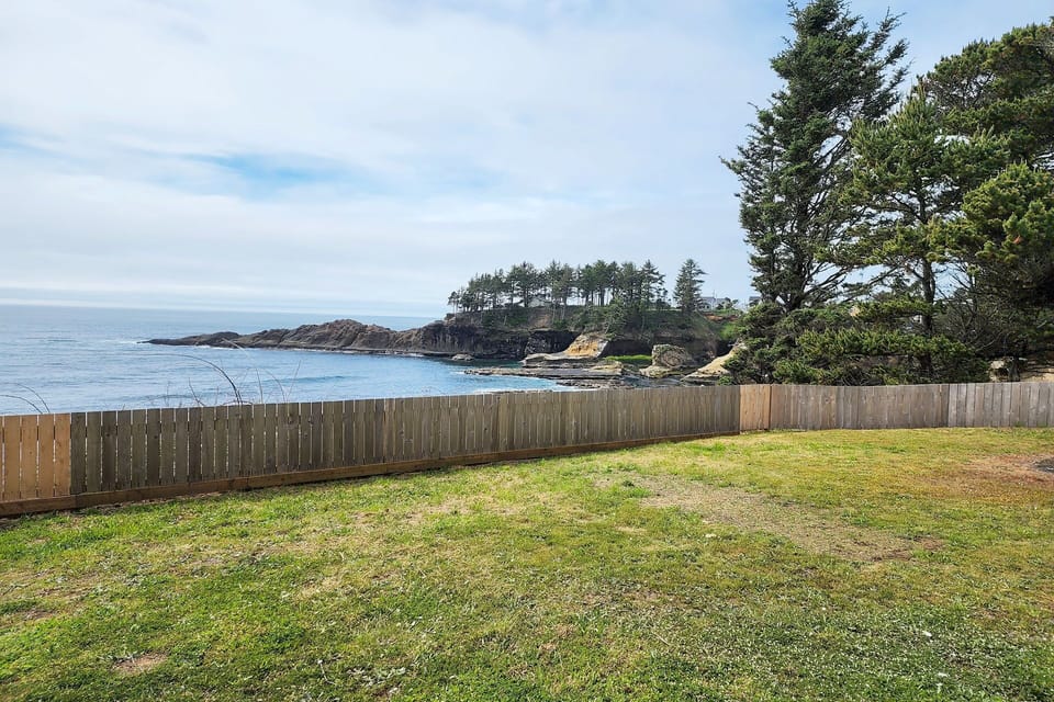 Large grassy yard for outdoor family fun.