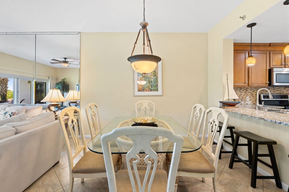 Gather around the glass-top dining table that seats six, ideal for shared meals or lively board games.

Professionally Managed by
Breathe Easy Rentals