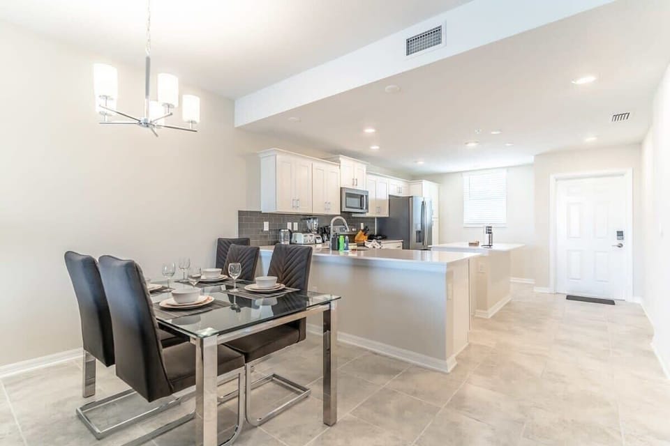 Dining area for 6, perfect for enjoying meals at home.