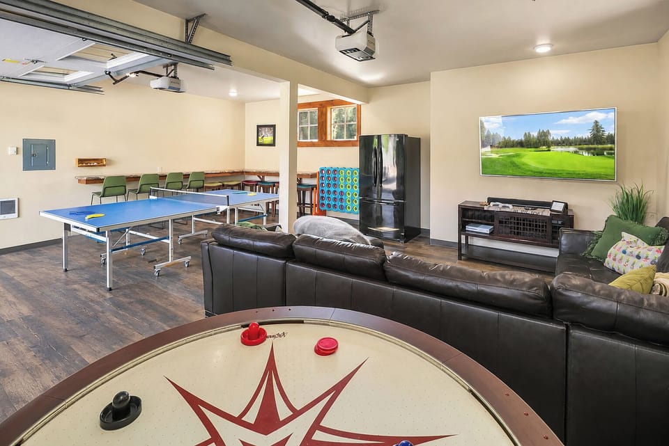 Elk Grove - Garage game room with Ping-Pong, Round Air Hockey, couch, fridge, and a TV lounge!