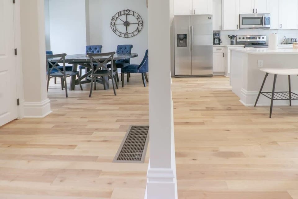 View of the open Floor Plan of Kitchen and Dining with plenty of natural light