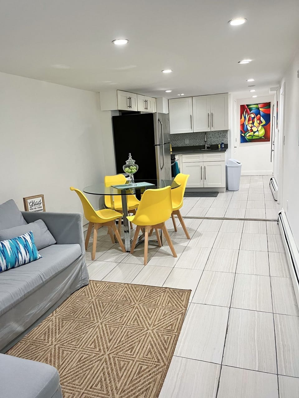 Open floor layout. Sofa bed converts to full bed with linens inside the ottoman