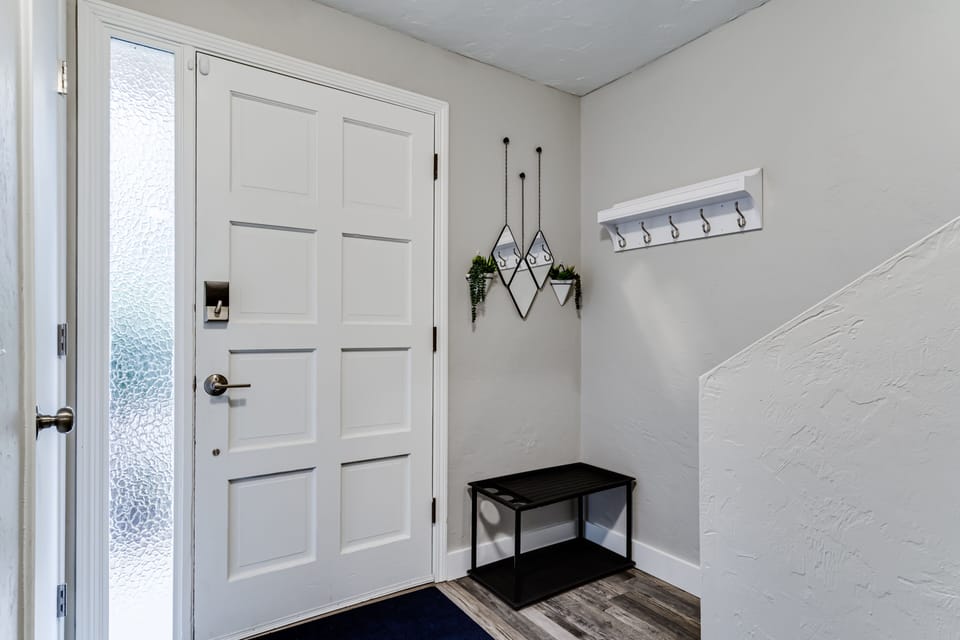 Entry way with storage for shoes, coats and umbrellas