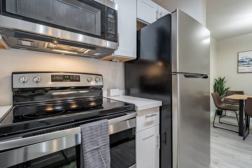 Alternate view of the kitchen showcasing our brand new appliances!