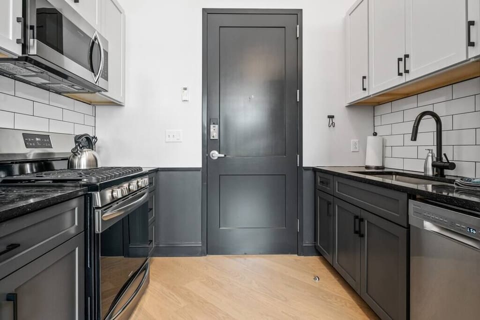Don't be fooled by the square footage - Mercantile on Morris features a plentifully stocked kitchen with a full size oven, range and fridge