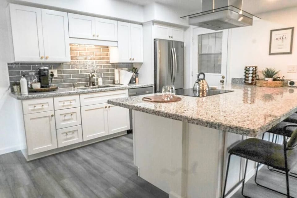 The Desert House features a fully stocked kitchen with brand new appliances and an oversized island
